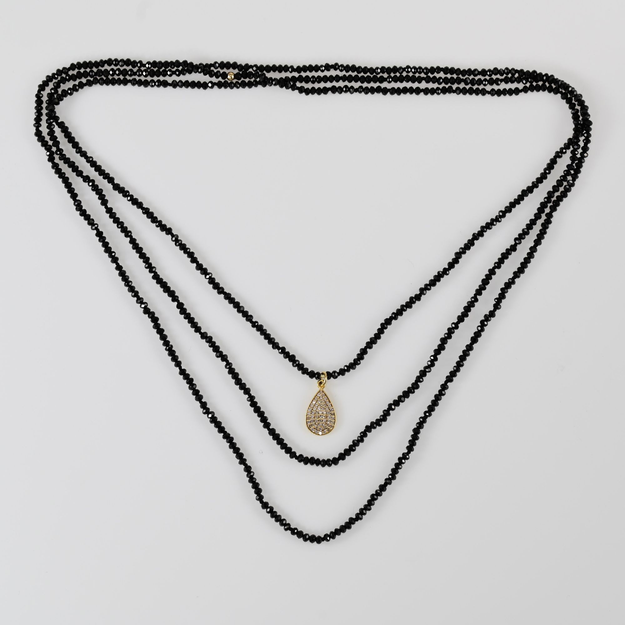 60" long necklace of Black Spinel, Diamonds, gold