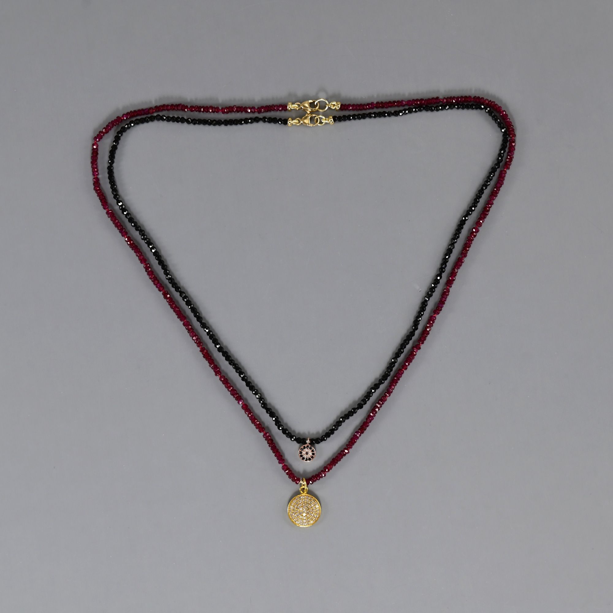 Delicate necklaces of Spinels,Ruby & Black with gold and Diamond drop