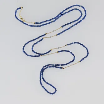 Fine Blue Sapphire beaded necklace with 18k,and floating Diamonds